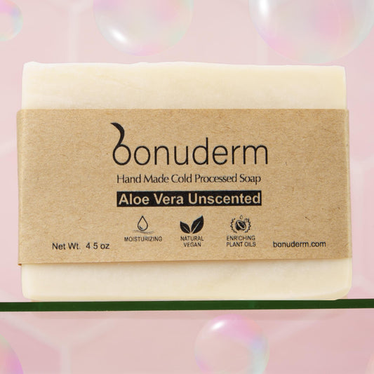 aloe vera soap with 'bonuderm' packaging on a pink background