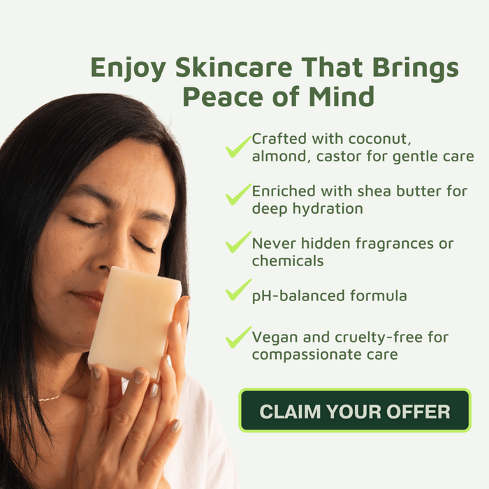 Woman holding a natural bar of soap with skincare benefits listed on a white background