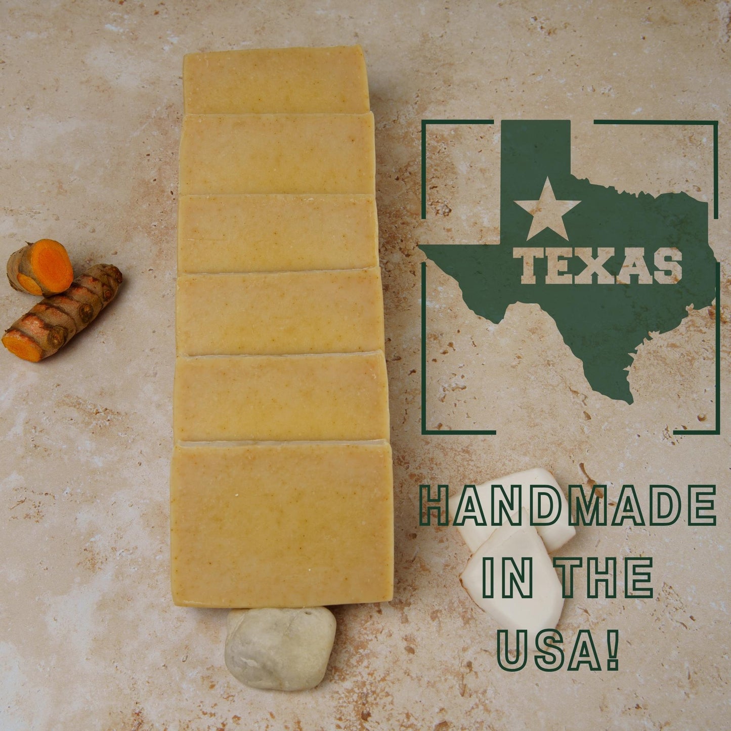 natural turmeric soap bars on a textured surface with a Texas map and 'Handmade in the USA!' text.