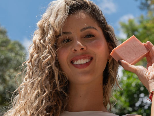 woman showing plant-based soap