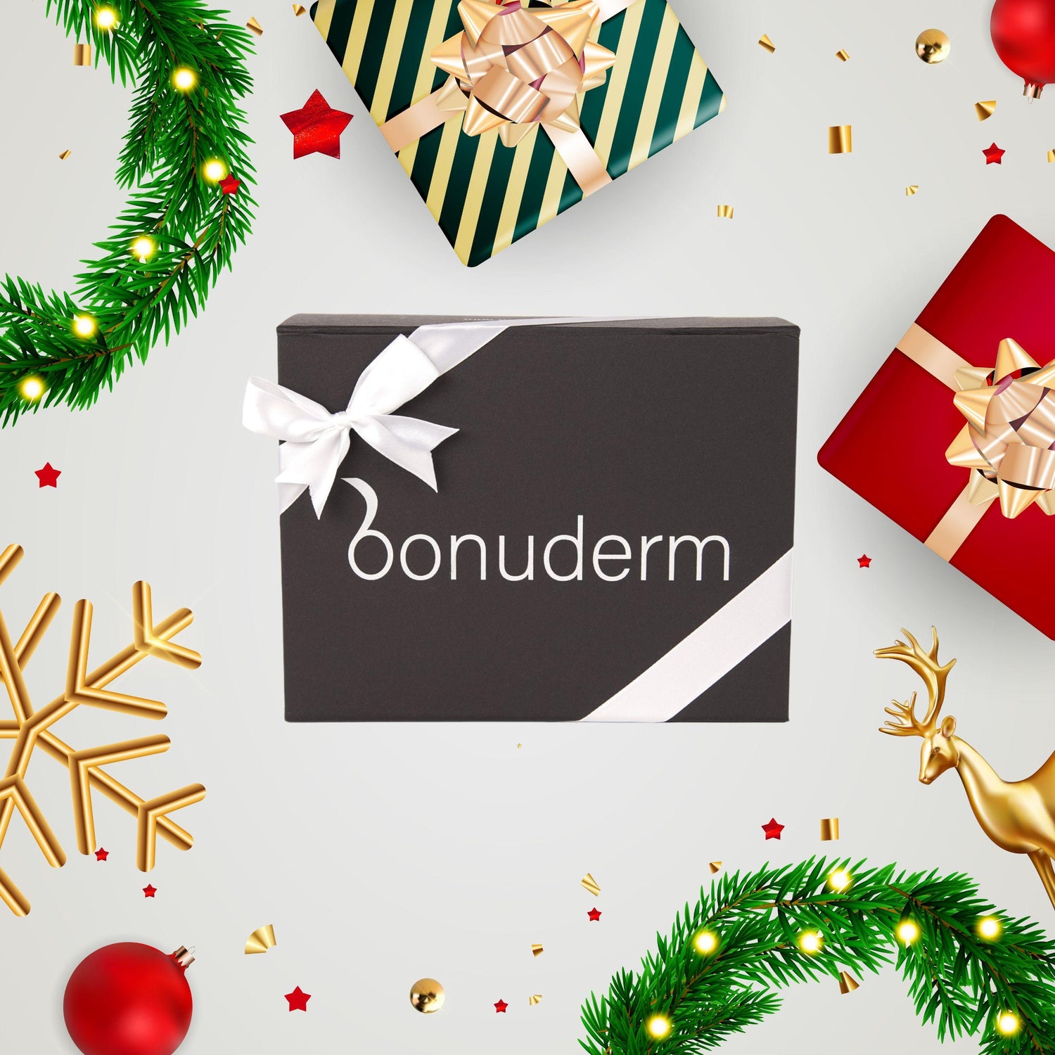 bonuderm gift box next to holiday gift boxes and Christmas ornaments 