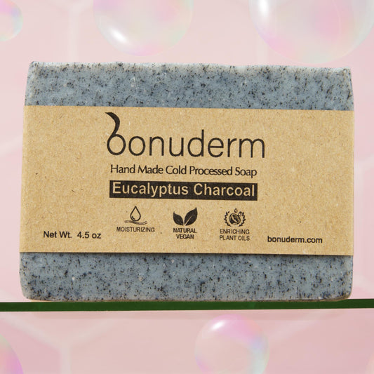 Bonuderm charcoal soap bar in eco-friendly kraft packaging for gentle cleansing and sensitive skin.
