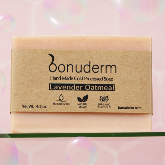 Oat soap with 'bonuderm' branding on a light pink background