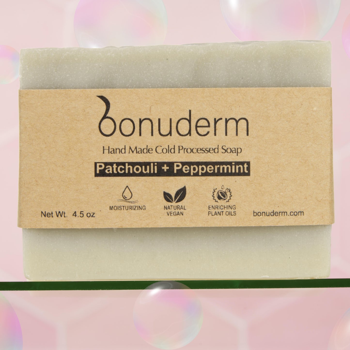 patchouli soap bar with packaging on a colorful background handmade by bonuderm