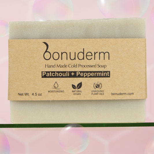 patchouli soap bar with packaging on a colorful background handmade by bonuderm