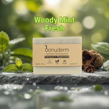 patchouli oil soap with 'Woody Mint Fresh' text on a natural background 